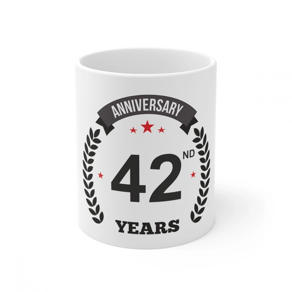 Aura Living Gear Ceramic 42nd Anniversary Printed Coffee Mug (Color: White, Capacity:330ml)